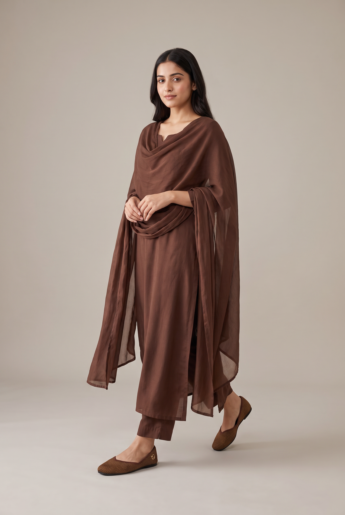 Rioz Sitara brown gold shimmer jutti worn with a tonal brown kurta set