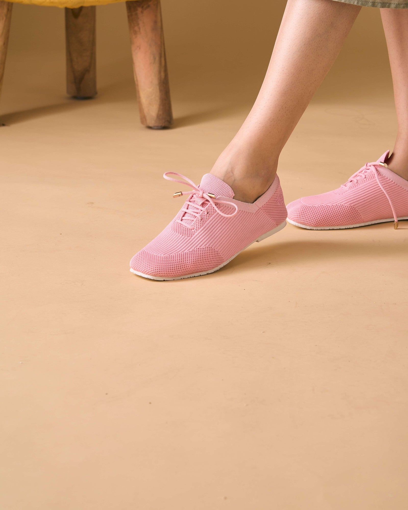 Rioz pink knit sneakers for women with breathable mesh design, lace-up closure, and white sole